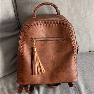 Brown leather backpack